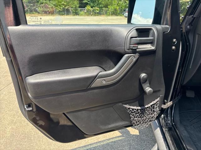 used 2015 Jeep Wrangler Unlimited car, priced at $20,705