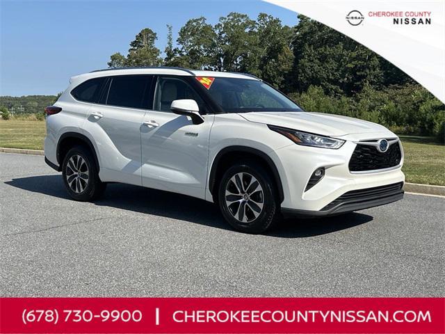 used 2020 Toyota Highlander Hybrid car, priced at $26,976