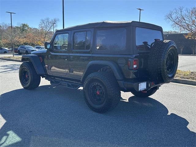 used 2021 Jeep Wrangler Unlimited car, priced at $31,810