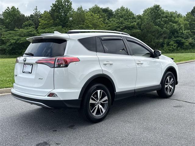 used 2018 Toyota RAV4 car, priced at $23,933