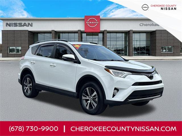 used 2018 Toyota RAV4 car, priced at $23,933