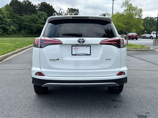 used 2018 Toyota RAV4 car, priced at $23,933