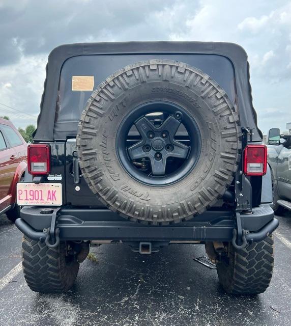 used 2015 Jeep Wrangler Unlimited car, priced at $23,900