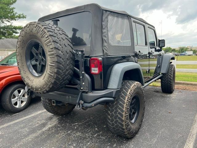 used 2015 Jeep Wrangler Unlimited car, priced at $23,900