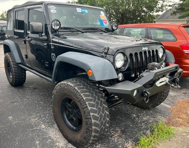 used 2015 Jeep Wrangler Unlimited car, priced at $23,900