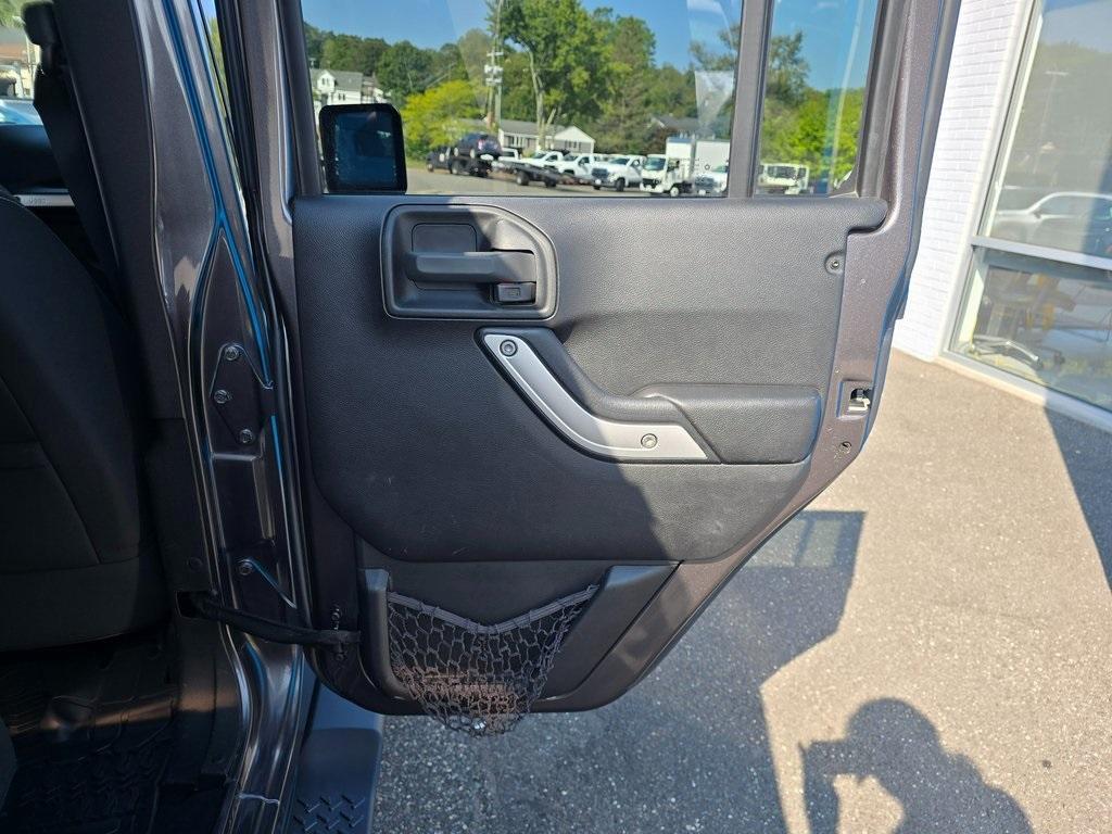 used 2016 Jeep Wrangler Unlimited car, priced at $19,586