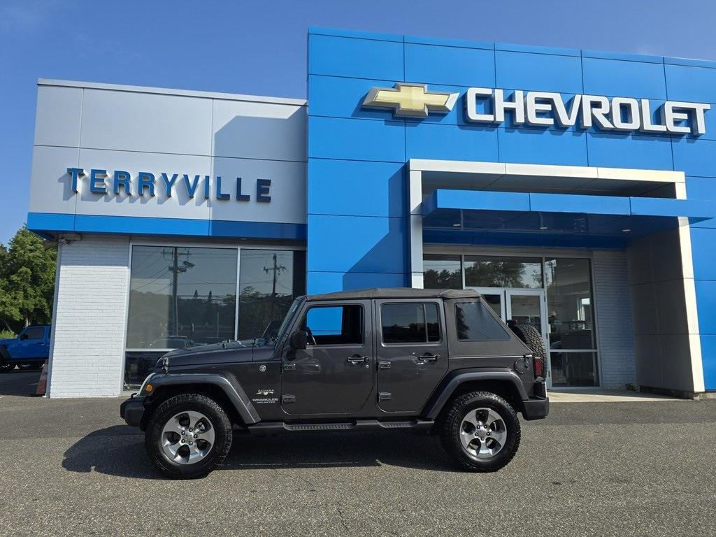 used 2016 Jeep Wrangler Unlimited car, priced at $19,586