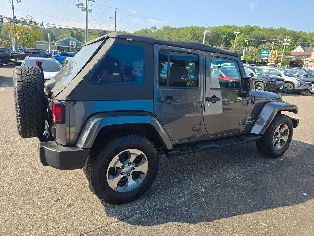 used 2016 Jeep Wrangler Unlimited car, priced at $19,586