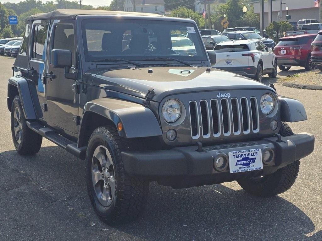 used 2016 Jeep Wrangler Unlimited car, priced at $19,586