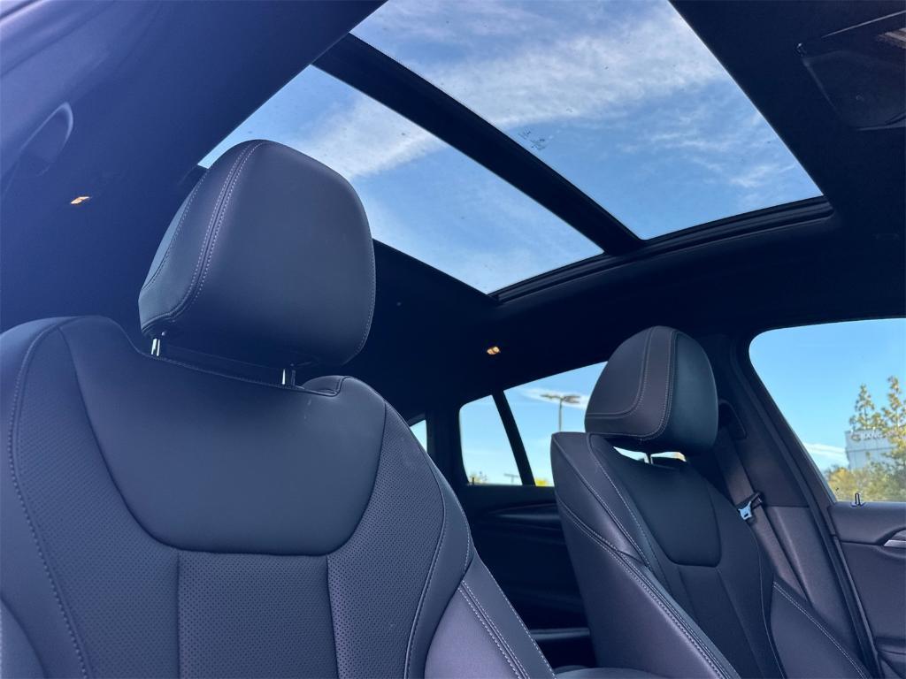 used 2023 BMW X4 car, priced at $43,957