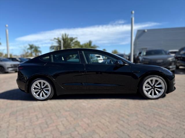 used 2022 Tesla Model 3 car, priced at $26,150