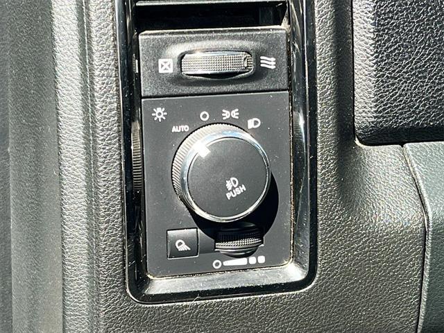 used 2015 Ram 1500 car, priced at $10,000