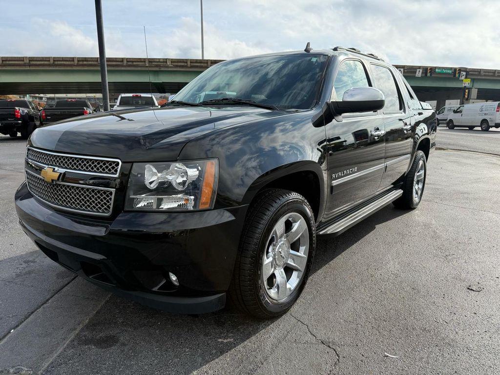 used 2013 Chevrolet Avalanche car, priced at $23,997