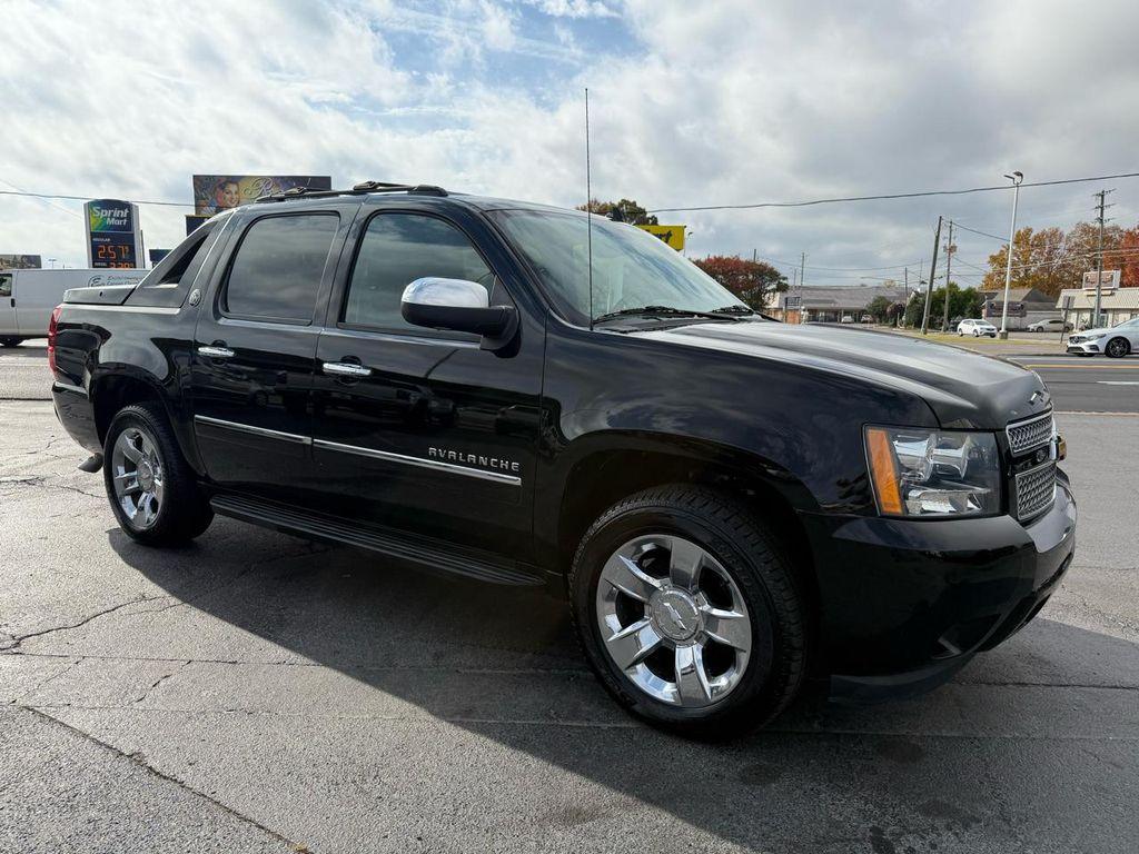 used 2013 Chevrolet Avalanche car, priced at $23,997