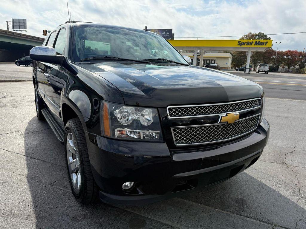 used 2013 Chevrolet Avalanche car, priced at $23,997
