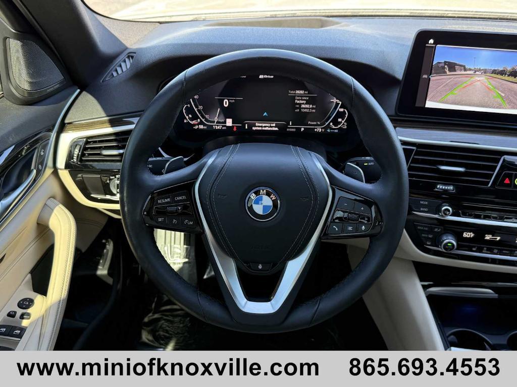 used 2023 BMW 530e car, priced at $38,640