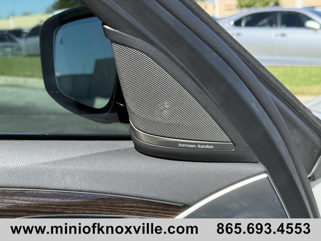 used 2023 BMW 530e car, priced at $38,640