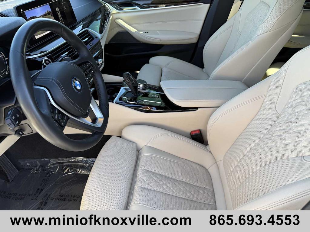 used 2023 BMW 530e car, priced at $38,640