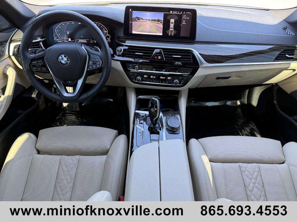 used 2023 BMW 530e car, priced at $38,640