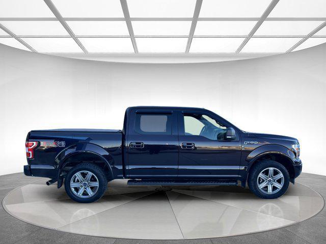 used 2018 Ford F-150 car, priced at $29,395