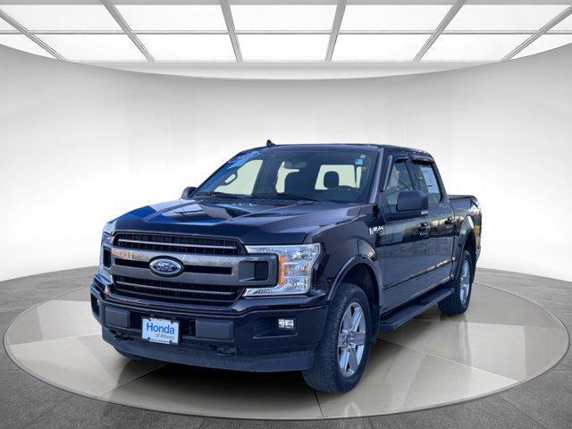 used 2018 Ford F-150 car, priced at $29,395