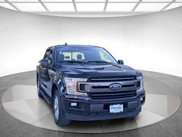 used 2018 Ford F-150 car, priced at $29,395