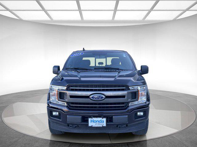 used 2018 Ford F-150 car, priced at $29,395