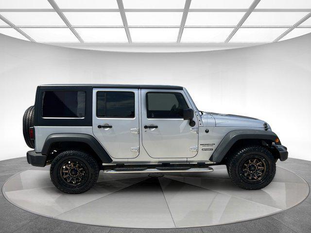 used 2012 Jeep Wrangler Unlimited car, priced at $14,895