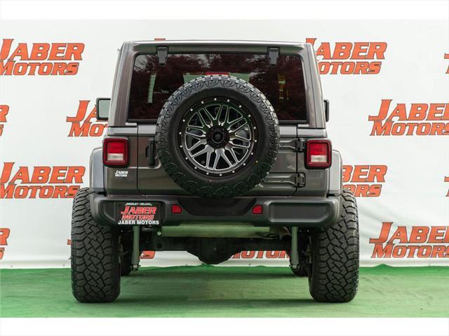 used 2021 Jeep Wrangler Unlimited car, priced at $37,997