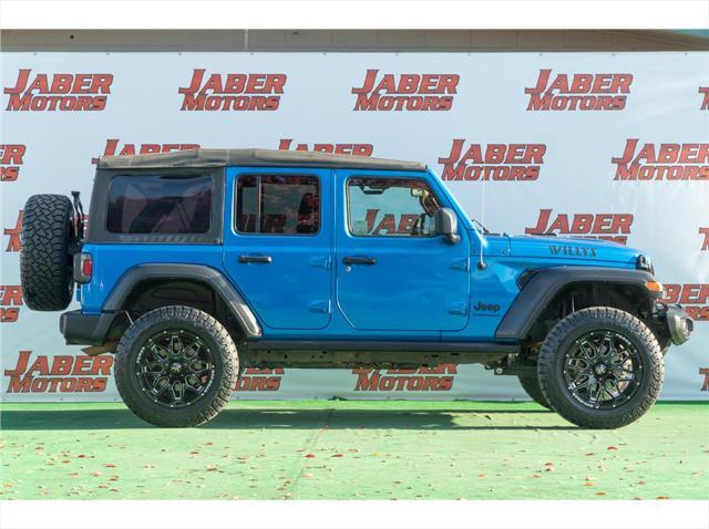 used 2023 Jeep Wrangler car, priced at $34,997