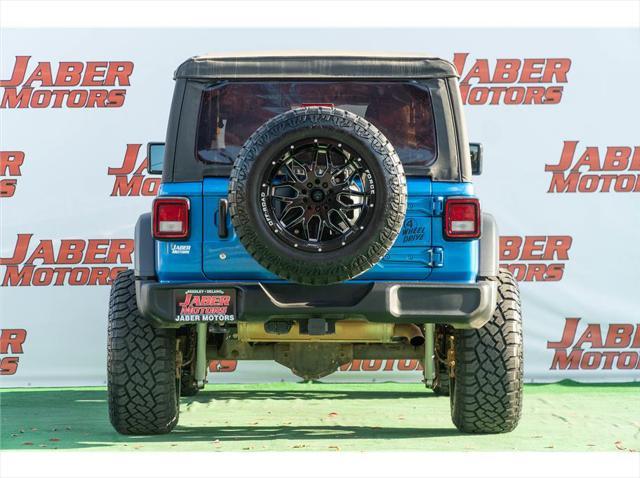 used 2023 Jeep Wrangler car, priced at $34,997