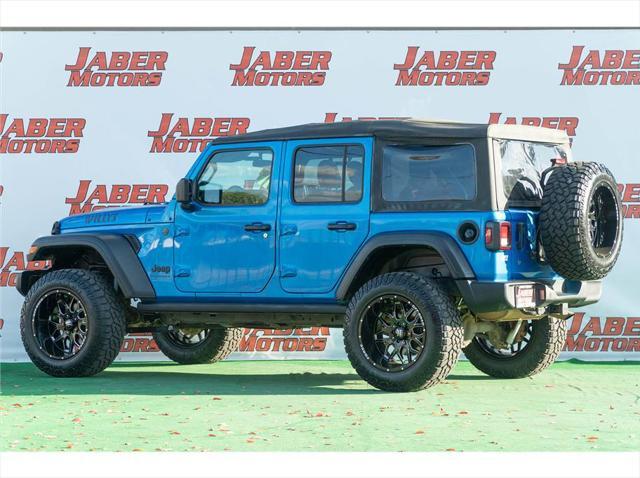 used 2023 Jeep Wrangler car, priced at $34,997