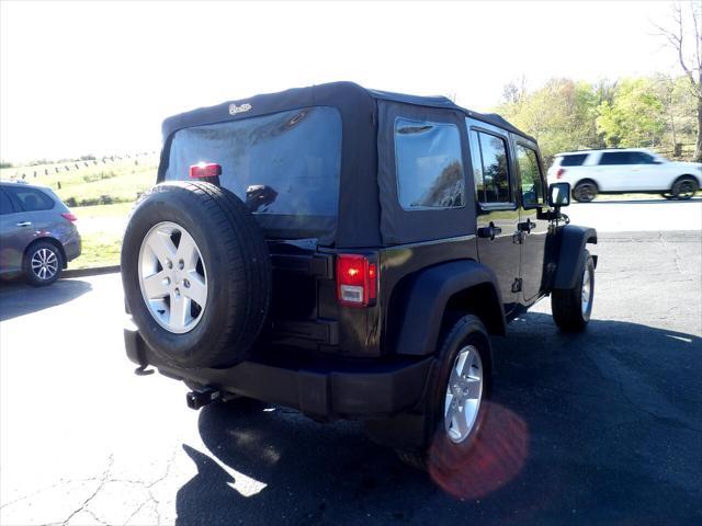 used 2013 Jeep Wrangler Unlimited car, priced at $12,995