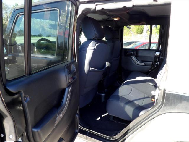 used 2013 Jeep Wrangler Unlimited car, priced at $12,995