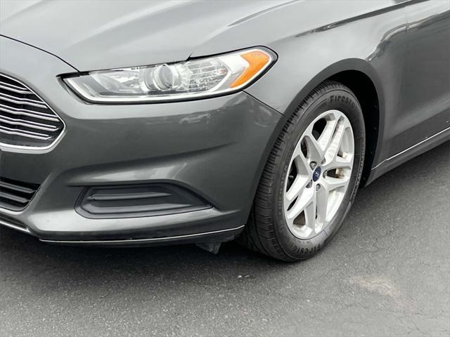 used 2015 Ford Fusion car, priced at $4,998