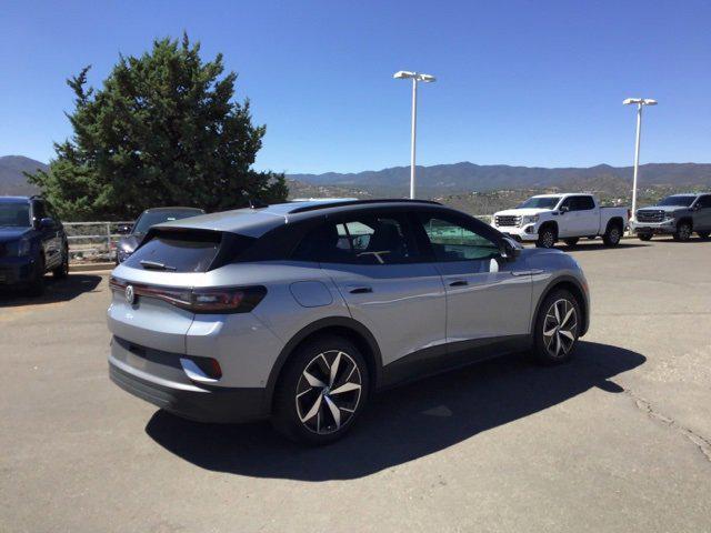 used 2023 Volkswagen ID.4 car, priced at $27,033