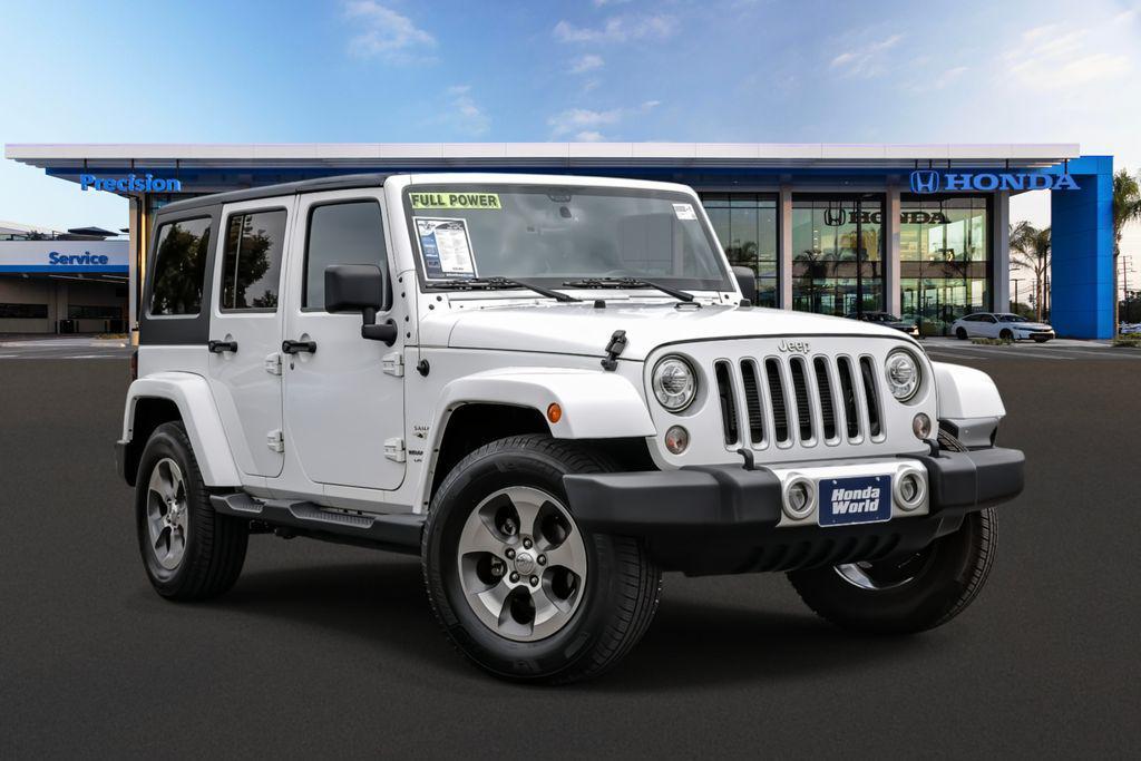 used 2018 Jeep Wrangler JK Unlimited car, priced at $23,998