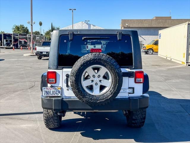 used 2015 Jeep Wrangler Unlimited car, priced at $18,998