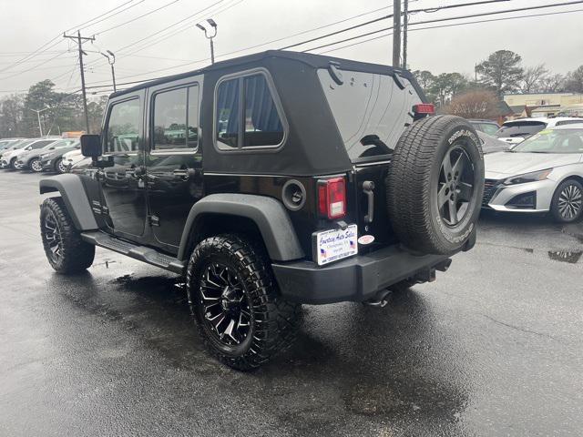 used 2014 Jeep Wrangler Unlimited car, priced at $15,990