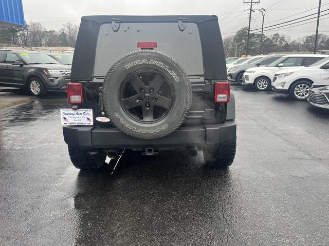 used 2014 Jeep Wrangler Unlimited car, priced at $15,990