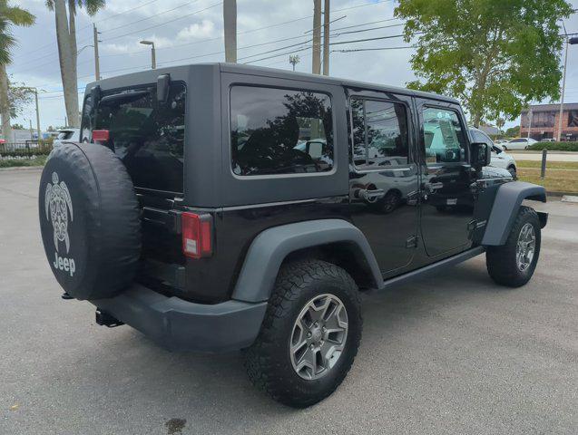 used 2016 Jeep Wrangler Unlimited car, priced at $22,997