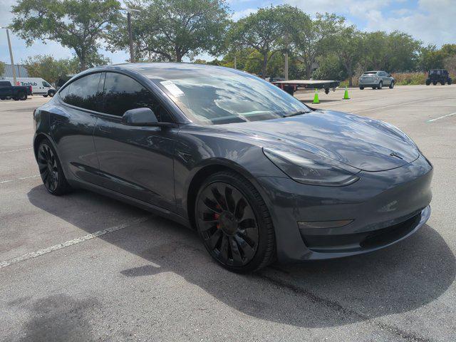 used 2023 Tesla Model 3 car, priced at $30,191