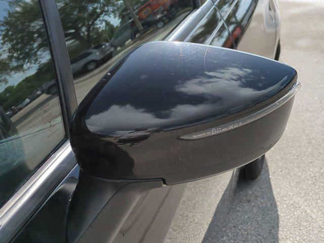 used 2021 Nissan Versa car, priced at $12,000