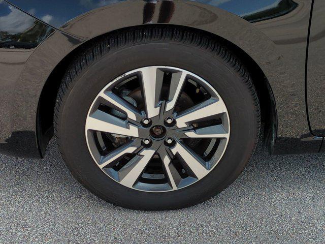 used 2021 Nissan Versa car, priced at $12,000