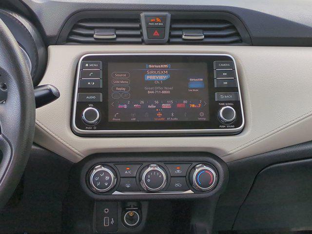 used 2021 Nissan Versa car, priced at $12,000