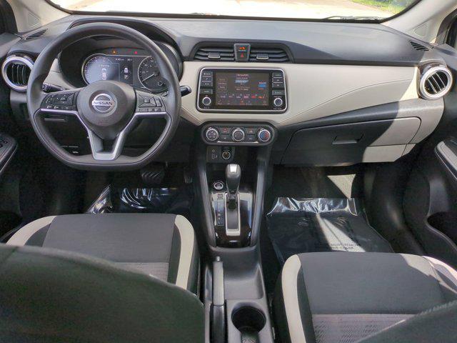 used 2021 Nissan Versa car, priced at $12,000