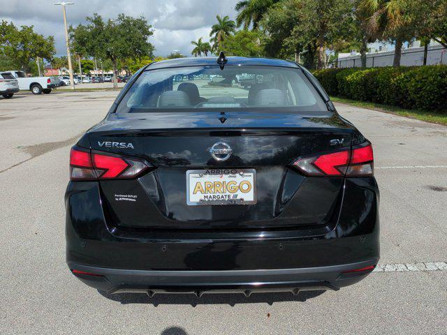 used 2021 Nissan Versa car, priced at $12,000