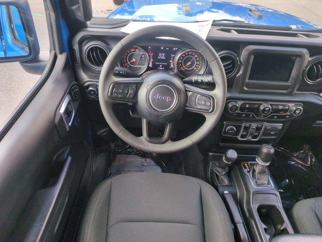 used 2023 Jeep Wrangler car, priced at $33,797