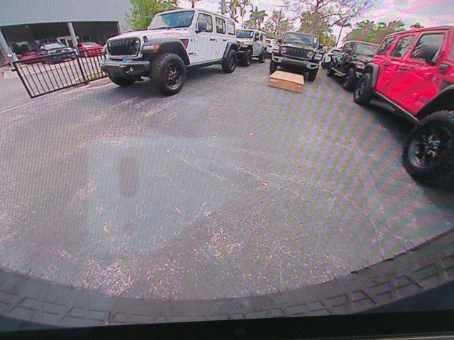 new 2024 Jeep Wrangler 4xe car, priced at $56,830