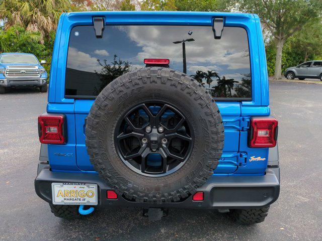 new 2024 Jeep Wrangler 4xe car, priced at $56,830